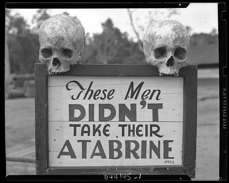 File:Atabrine advertisement in Guinea during WW2.jpg