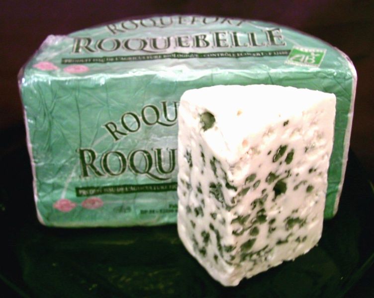 Roquefort cheese, with blue P. roqueforti veins
