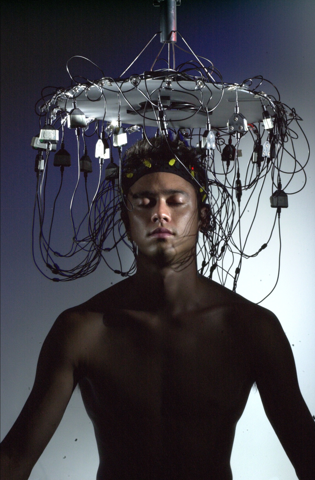 EEG used during a music performance in which bathers from around the world were networked together as part of a collective musical performance, using their brainwaves to control sound, lighting, and the bath environment
